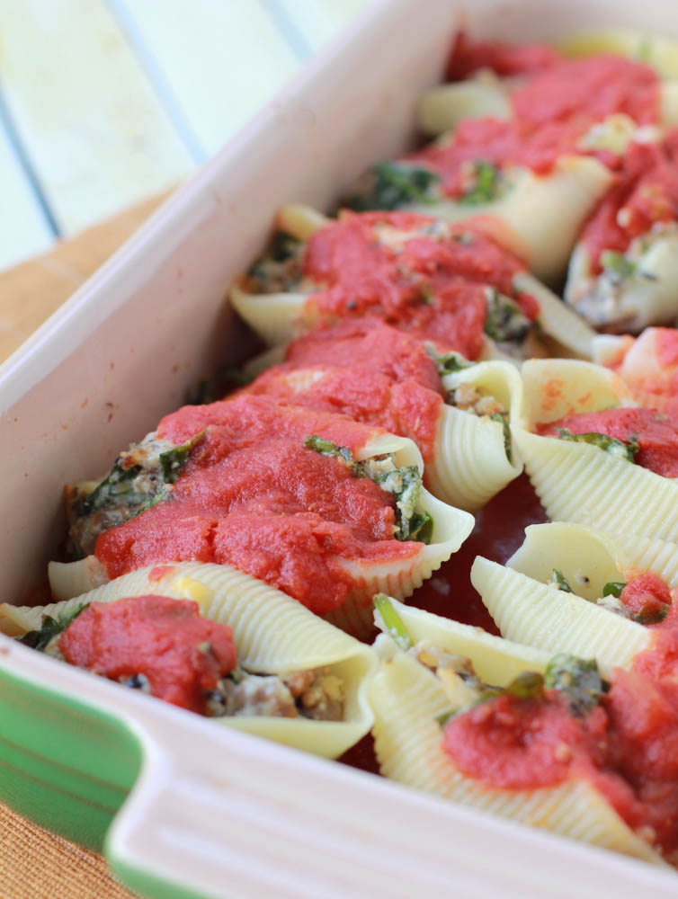 Italian Sausage Stuffed Shells, y'all! Filled with veggies, it's a great way to sneak those veggies into those picky eaters.