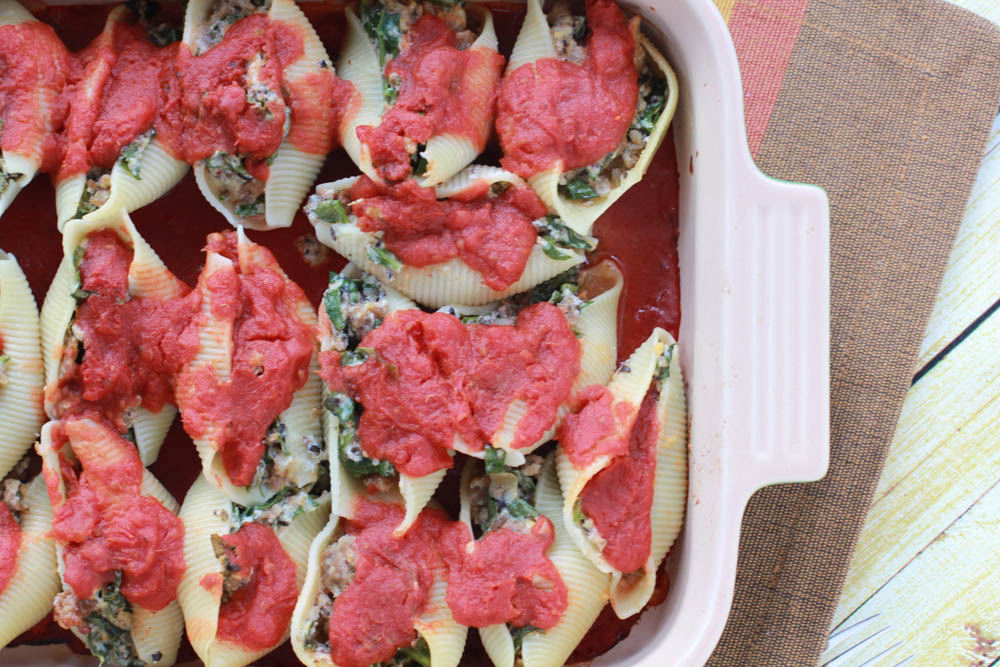 Italian Sausage Stuffed Shells, y'all! Filled with veggies, it's a great way to sneak those veggies into those picky eaters.