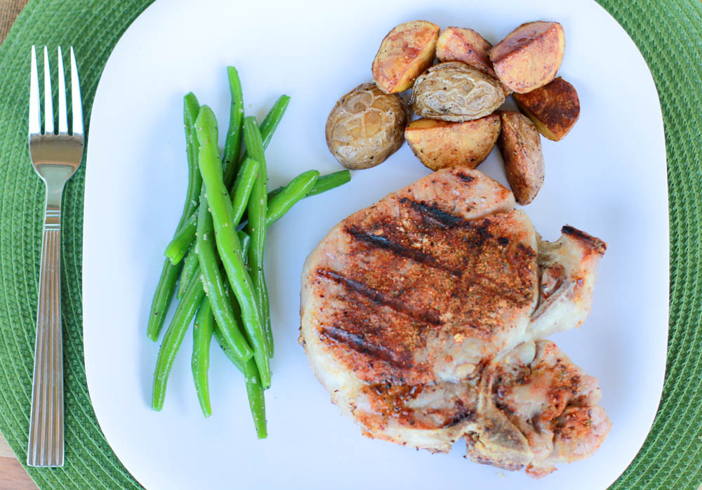 Don't know what to do with a Porterhouse Pork Chop? Make your own steak rub and make the Perfect Grilled Porterhouse Pork Chop!