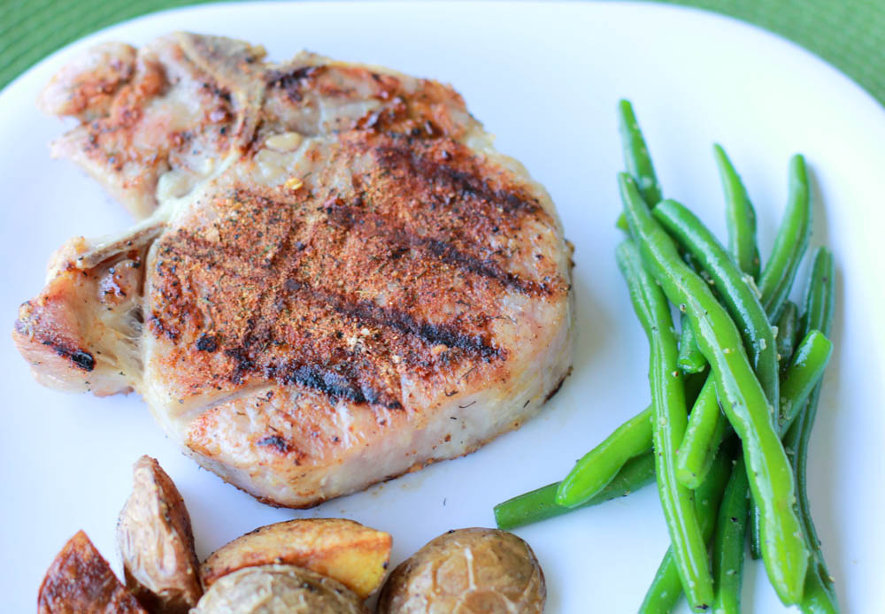 Don't know what to do with a Porterhouse Pork Chop? Make your own steak rub and make the Perfect Grilled Porterhouse Pork Chop!