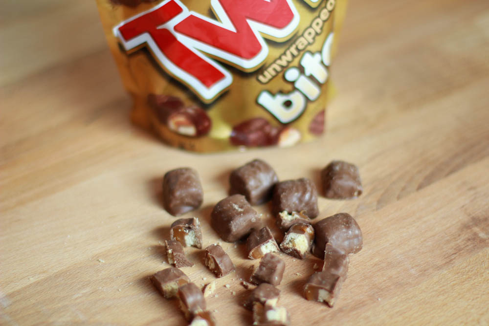 Chocolate Chip TWIX Cookies - a traditional chocolate chip cookie with pieces of Twix throughout. Chocolate Chip TWIX Cookies are perfect for sharing!