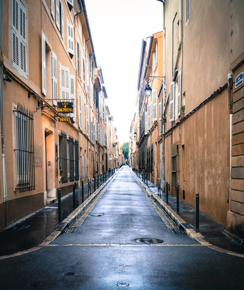 empty street in aix en provence france lined with buildings