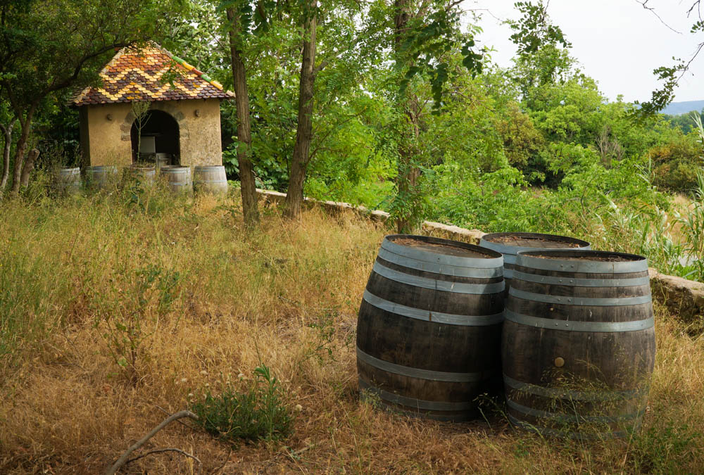 old wine barrels on canal du midi in homps france