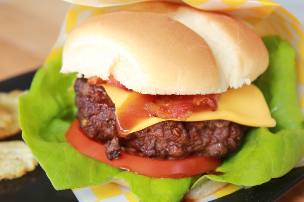 Fire up the grill and enjoy an All American Grilled BBQ-Bacon Cheeseburger!