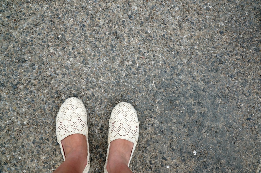 feet walking on road in carcassonne france