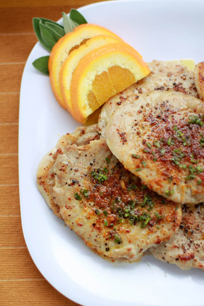 These Orange Sage Pork Chops make the best pork chops. Get the pork chop recipe at simplybeingmommy.com.