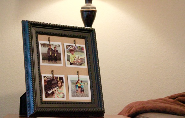 Repurpose an old thrift store picture frame and create a beautiful DIY Clothespin Picture Frame.
