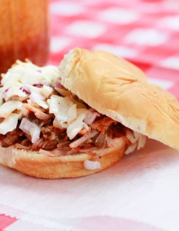 Enjoy the flavors of your favorite buffalo wings with this Slow Cooker Buffalo Pulled Pork Sandwiches Recipe.