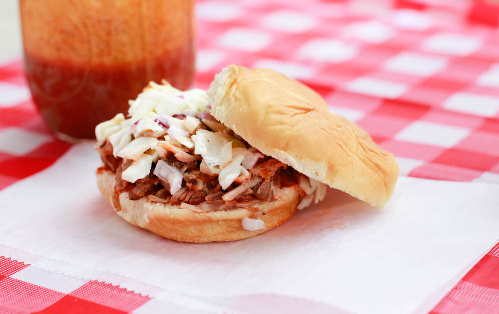 Enjoy the flavors of your favorite buffalo wings with this Slow Cooker Buffalo Pulled Pork Sandwiches Recipe.