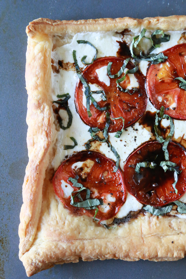 Making this Easy Caprese Pizza will be the best thing you did for yourself today. Made with Puff Pastry, it's the easiest pizza you'll ever make!