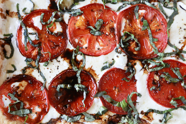 Making this Easy Caprese Pizza will be the best thing you did for yourself today. Made with Puff Pastry, it's the easiest pizza you'll ever make!