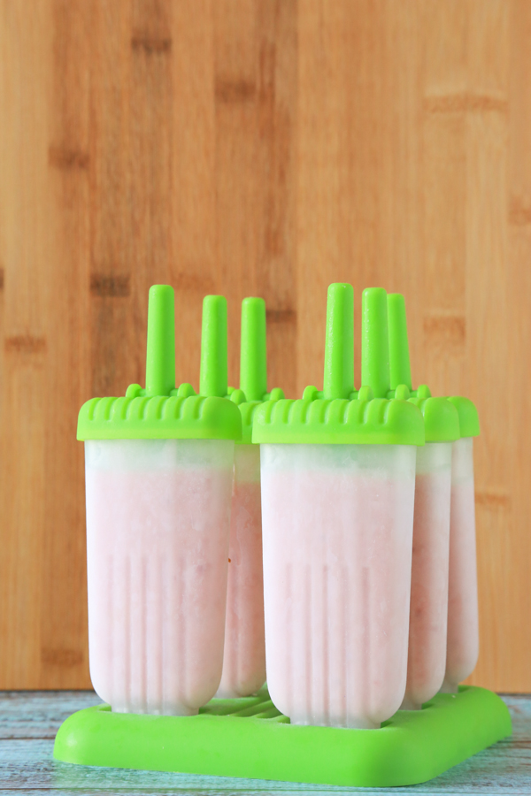 Cool down this summer with these refreshing Tropical Fruit Smoothie Pops.