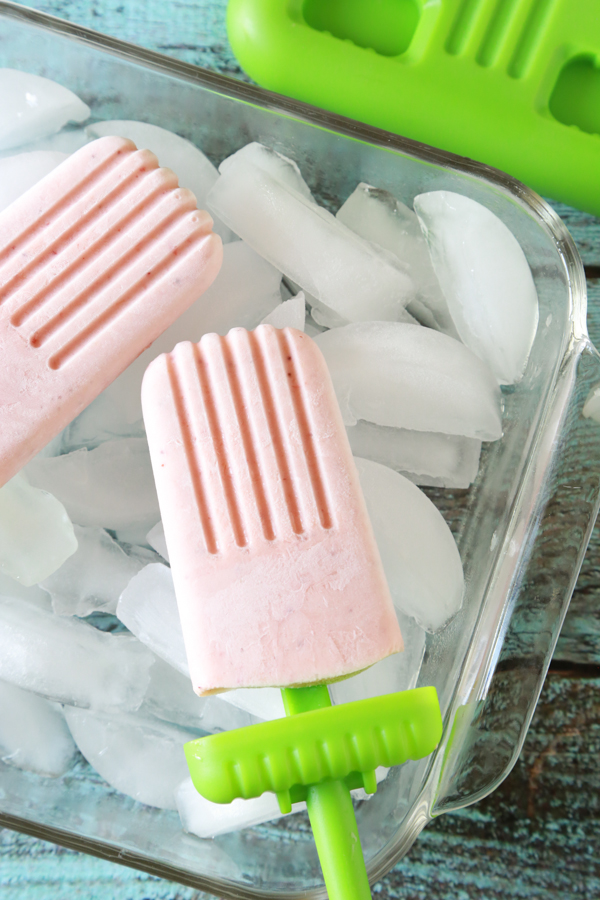 Cool down this summer with these refreshing Tropical Fruit Smoothie Pops.
