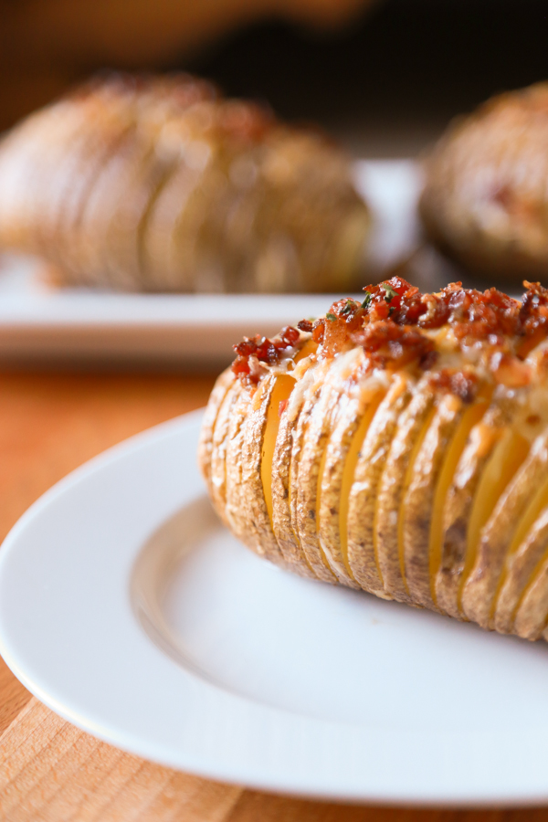 Hasselback Potatoes are a household favorite. Take yours to the next level by adding some bacon and cheese to create these Bacon & Cheese Hasselback Potatoes.