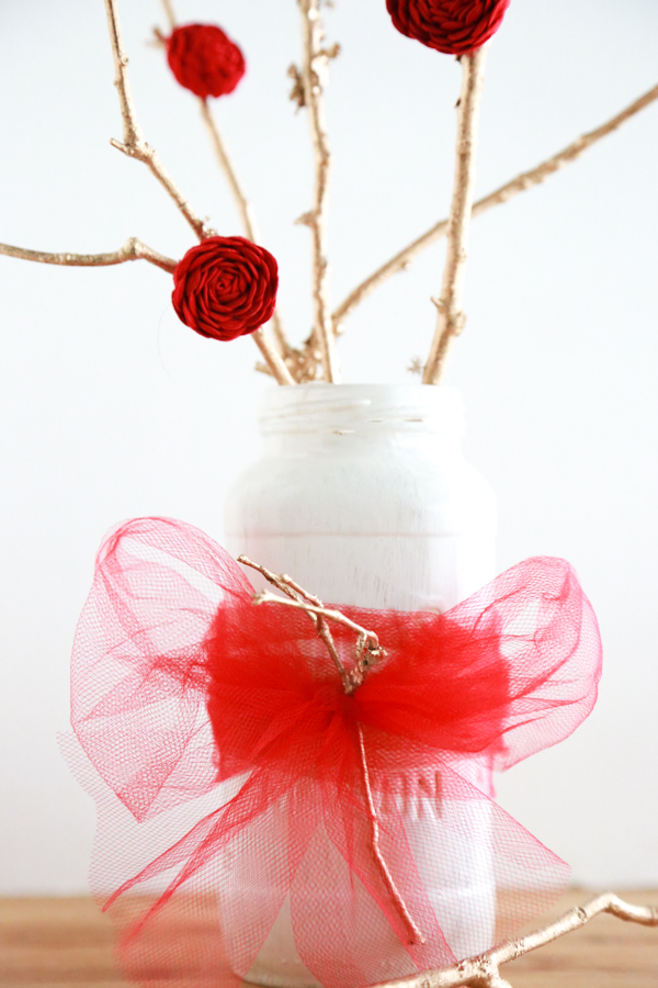 An elegant and stunning Valentine's Day decoration. Create this Easy Valentine's Day Tree Centerpiece with items sitting around your home and yard.