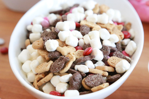 Make a non-messy smores mix with this easy to make Valentine's S'mores Mix. Minimal ingredients but so much to enjoy!