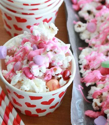 Valentine's Popcorn - an easy Valentine's treat with popcorn, conversation hearts, and M&M's.