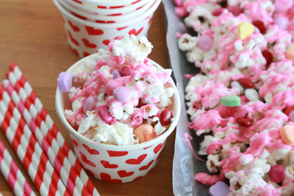 Valentine's Popcorn - an easy Valentine's treat with popcorn, conversation hearts, and M&M's.