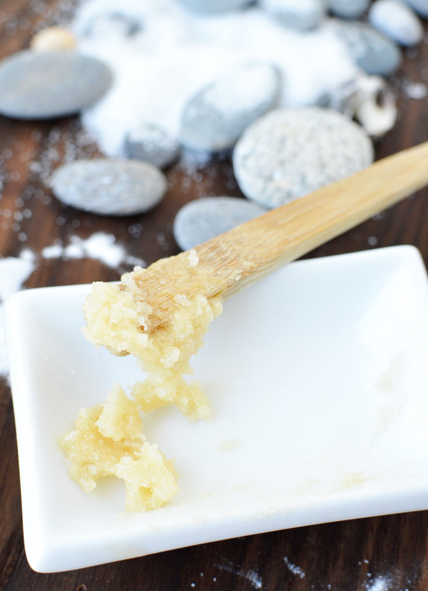 An easy DIY body scrub perfect for hard to remove paints and markers on your hands. All you need is two ingredients for this Honey Sea Salt Body Scrub.