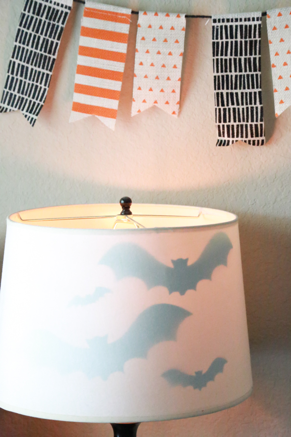 Get the right amount of spooky with this Halloween Bat Lamp Shade. Such a simple way to decorate for Halloween.