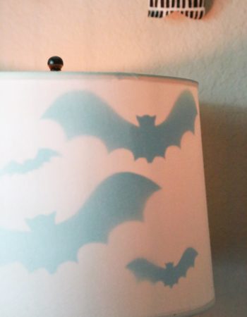 Get the right amount of spooky with this Halloween Bat Lamp Shade. Such a simple way to decorate for Halloween.