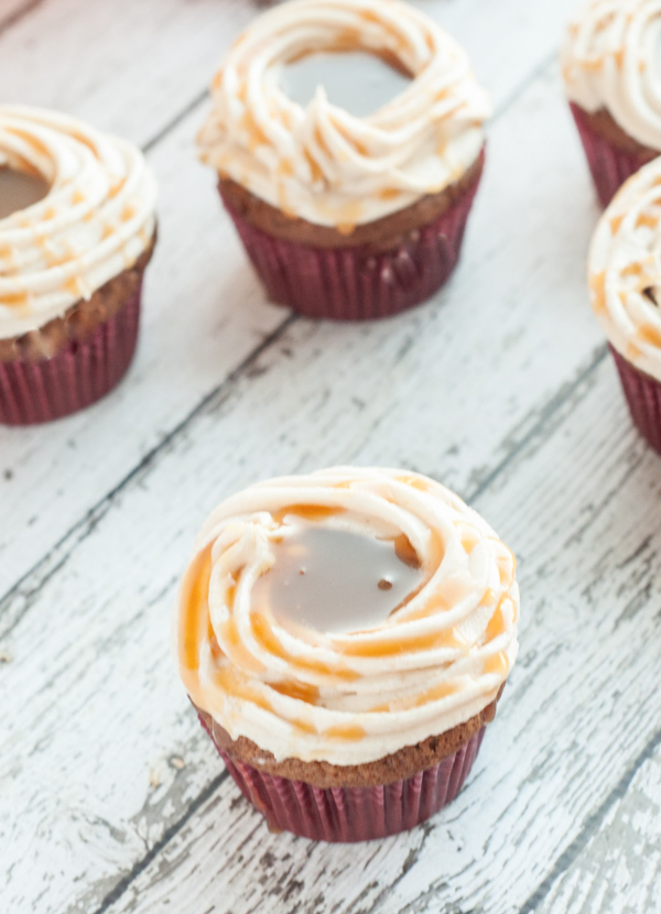 Love Caramel Apples? Then you'll love these delicious Caramel Apple Cupcakes featuring your favorite fall flavors! Get the recipe.