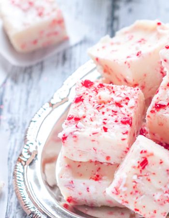 This Easy White Chocolate Peppermint Fudge is a great way to celebrate the holidays. It's such a tasty, festive treat for friends and family.