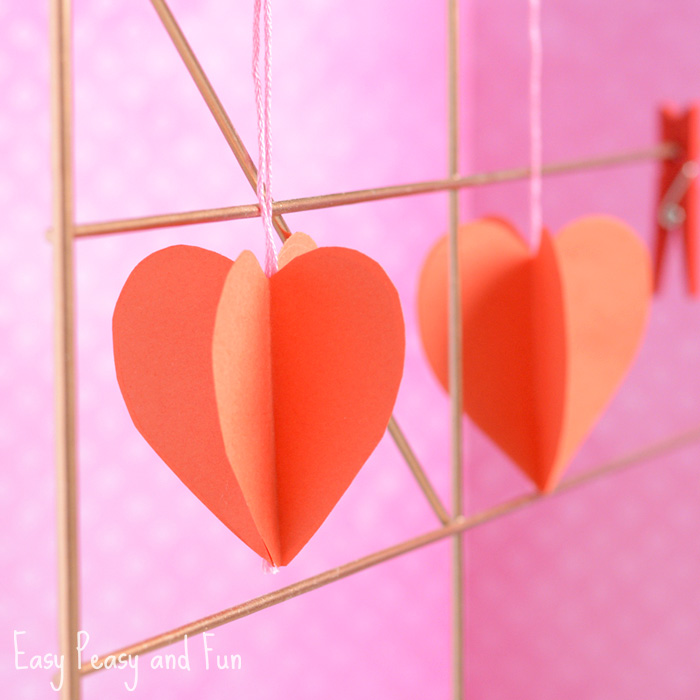 a 4D hanging heart made from string and cardstock paper