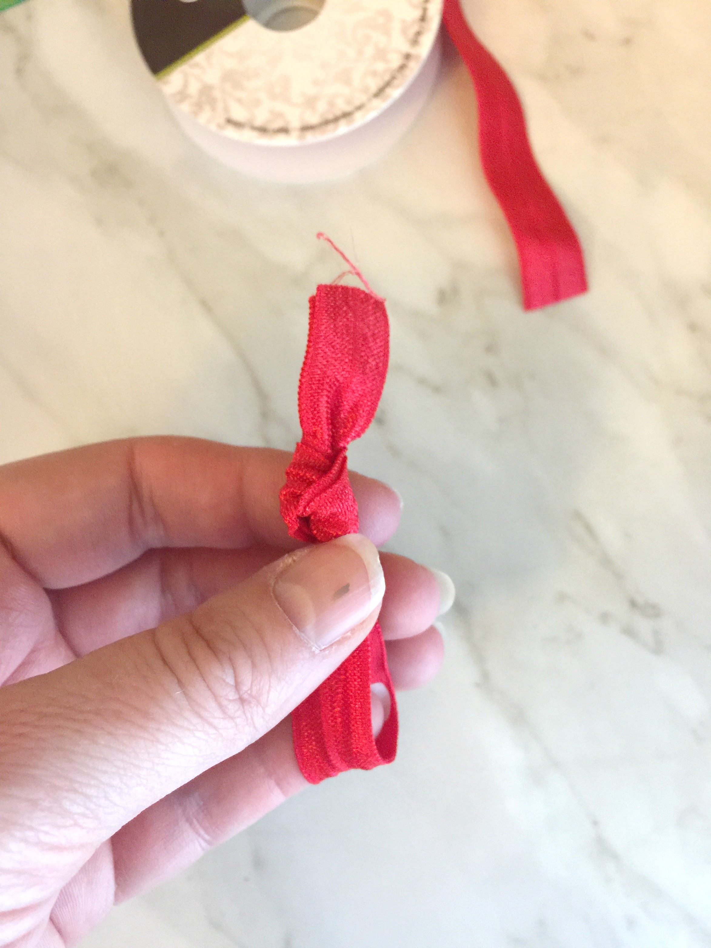 Going on a Disney cruise? Looking for Fish Extender gift ideas? Make these Disney cruise inspired DIY Hair Ties from fold over elastic.