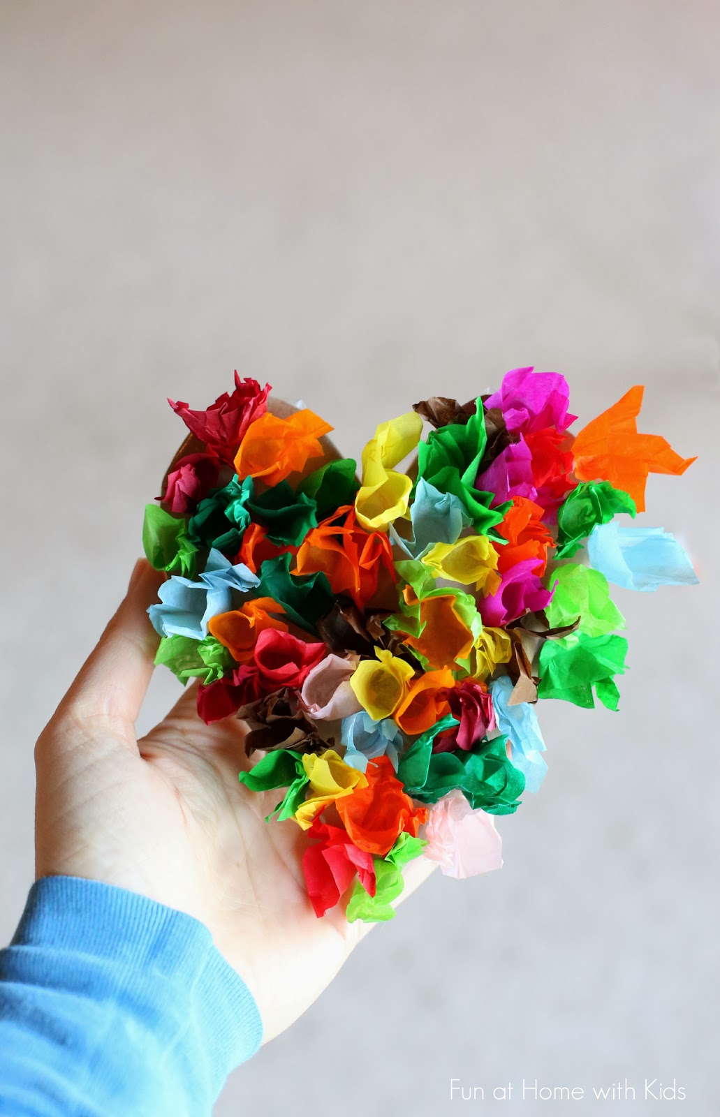 a colored heart made out of colored tissue paper