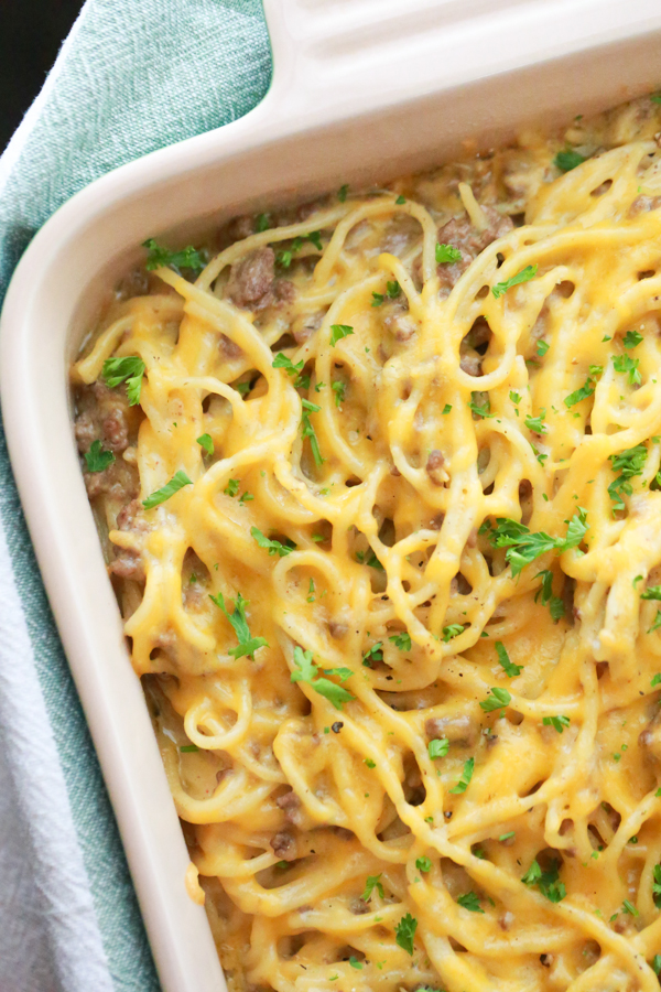 If you want a delicious, easy dinner, ready to go in an hour, try making this Beefy Cheesy Baked Spaghetti for dinner tonight!