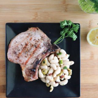 Fire up the grill and make these delicious Grilled Pork Chops with Tuscan Bean Salad.