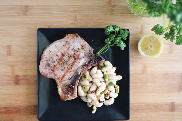 It's time to fire up the grill and enjoy the last days of summer with these delicious Grilled Pork Chops with Tuscan Bean Salad. 