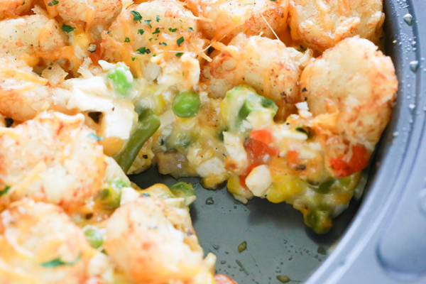 A delicious pan full of Chicken Pot Pie Tater Tot Casserole