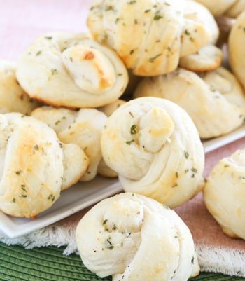 Turn refrigerated biscuit dough into these buttery Easy Garlic Parmesan Knots that melt right in your mouth. You won't be sorry that you did - I promise.