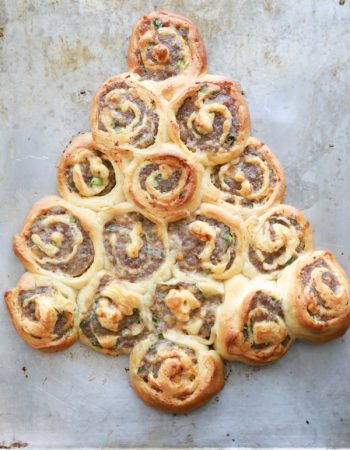 Get festive with a Sausage Rollup Christmas Tree. With just 4 ingredients you can make this delicious holiday appetizer.
