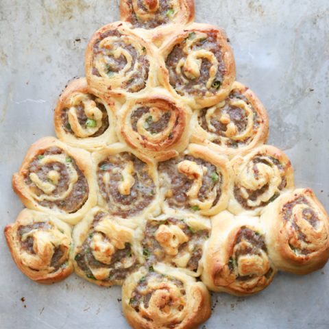 Get festive with a Sausage Rollup Christmas Tree. With just 4 ingredients you can make this delicious holiday appetizer.