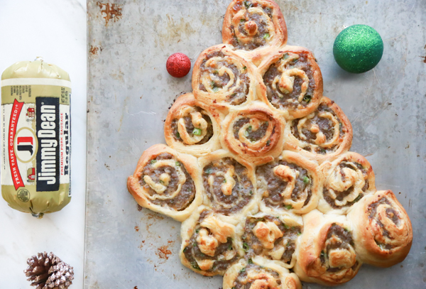 Get festive with a Sausage Rollup Christmas Tree. With just 4 ingredients you can make this delicious holiday appetizer.