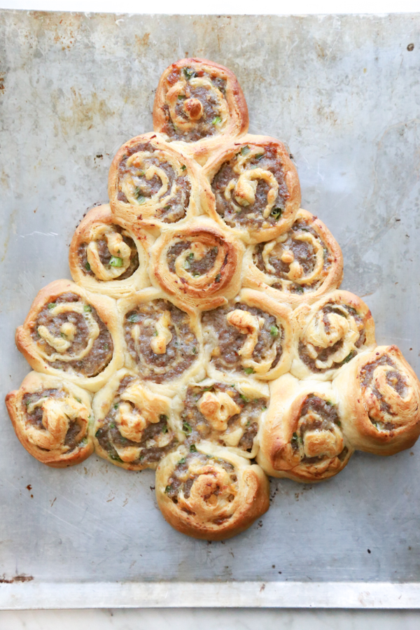 Get festive with a Sausage Rollup Christmas Tree. With just 4 ingredients you can make this delicious holiday appetizer.