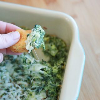 Whether you're celebrating the Big Game, National Corn Dog Day, or St. Patrick's Day, this Cheesy Hot Spinach Dip is a great way to kick off the party.