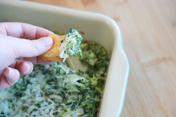 Whether you're celebrating the Big Game, National Corn Dog Day, or St. Patrick's Day, this Cheesy Hot Spinach Dip is a great way to kick off the party.