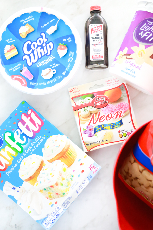 all the ingredients needed to make a colorful batch of Funfetti Rainbow Dip.