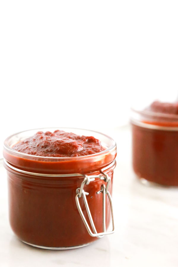 two jars full of homemade texas bbq sauce