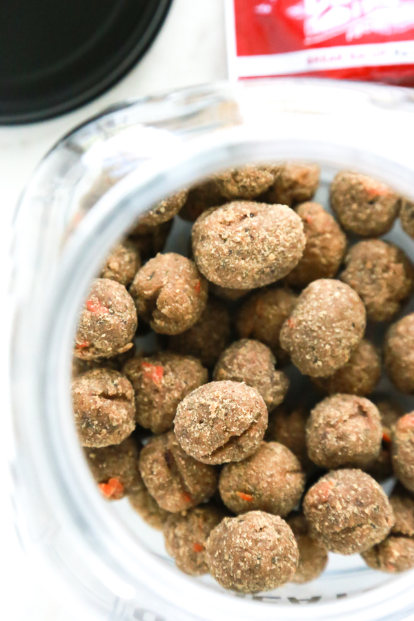 meatball dog treats stored inside of a homemade dog treat jar