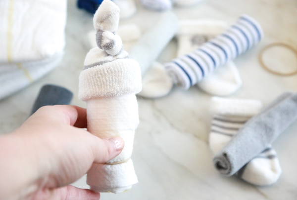 These adorable little DIY Diaper Babies are super cute, easy to make and make the perfect accompaniment to any baby shower gift.